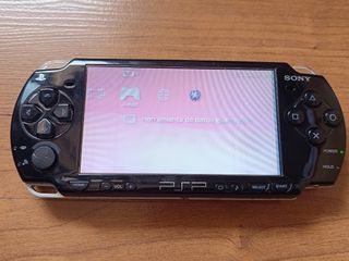 Sony PSP 2004 + cargador + bateria nueva