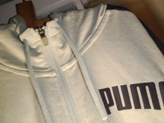 Sudadera Puma beige con capucha
