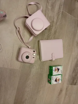 Instax Mini 12 rosa + funda+packs de fotos+álbum
