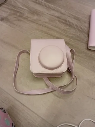 Instax Mini 12 rosa + funda+packs de fotos+álbum