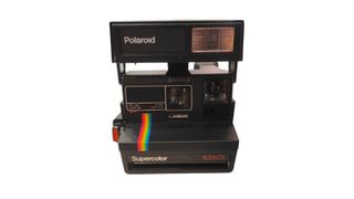 CAMARA DE FOTOS POLARIOD SUPERCOLOR + CAJA *DECORACION*