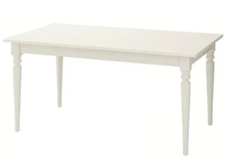 Mesa de comedor blanca de madera