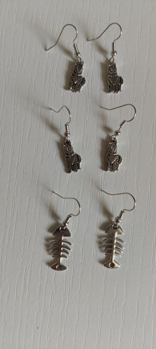 Pendientes plata perros & peces Ver más eni perfil