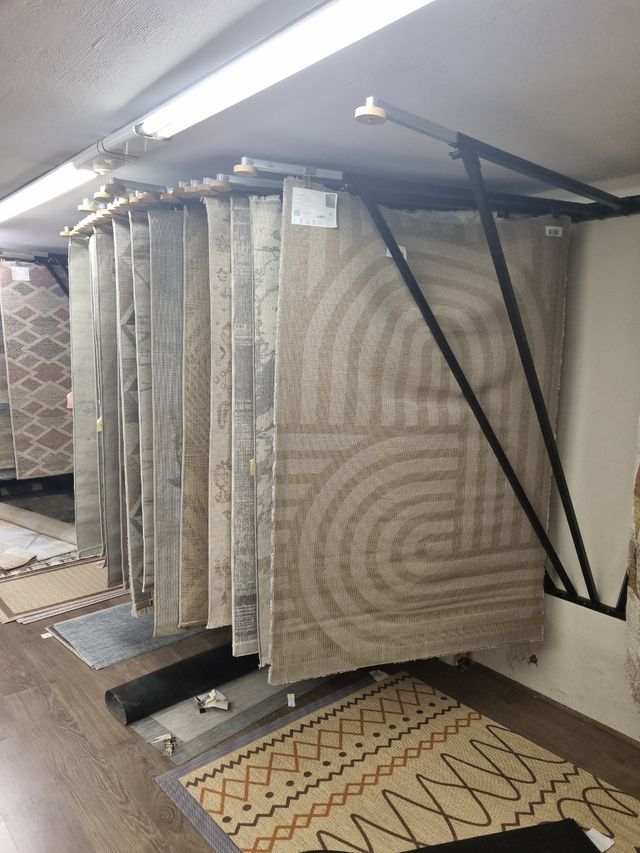 Expositores alfombras de pared