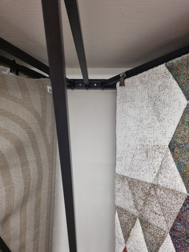 Expositores alfombras de pared