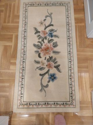 Juego de 2 alfombras de lana beige-rosa.