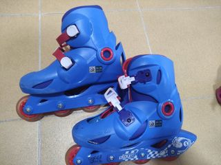 Patines Oxelo 4 ruedas ajustables.
