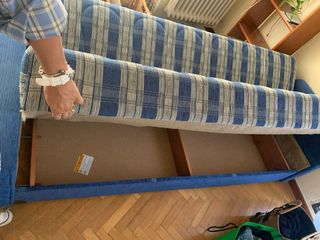 Sofá cama azul y blanco