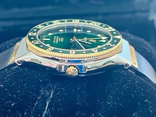 Reloj Hublot Classic MDM GMT Verde en acero y oro.