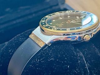Reloj Hublot Classic MDM GMT Verde en acero y oro.