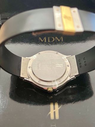 Reloj Hublot Classic MDM GMT Verde en acero y oro.