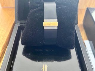 Reloj Hublot Classic MDM GMT Verde en acero y oro.
