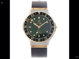 Reloj Hublot Classic MDM GMT Verde en acero y oro.