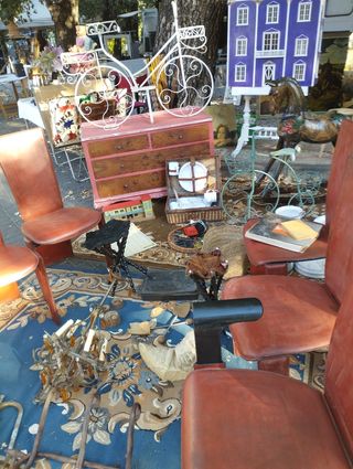 Sillas escultura años sesenta  de cuero  marrones.