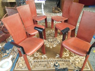 Sillas escultura años sesenta  de cuero  marrones.