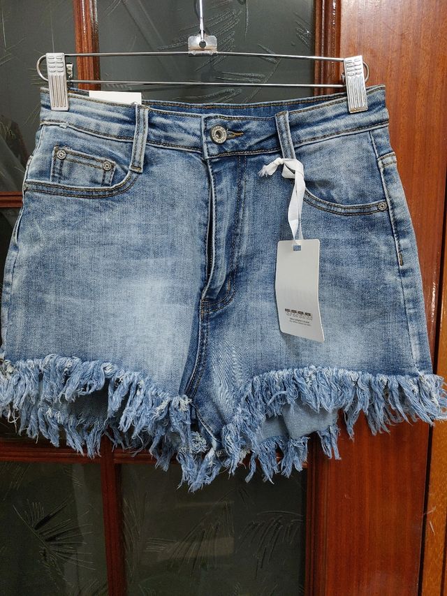 Short vaquero con flecos