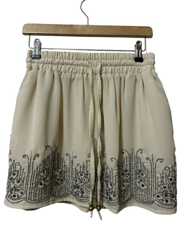 Falda beige pedrería