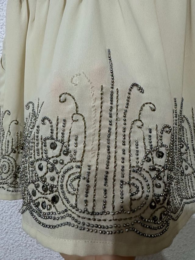 Falda beige pedrería