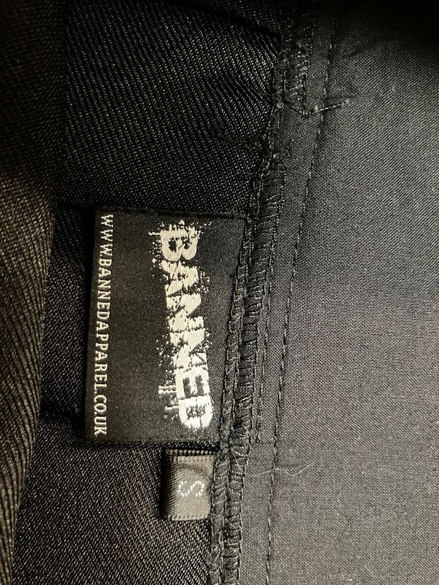 2 minifaldas plisadas: negra & de cuadros