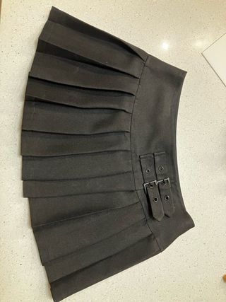 2 minifaldas plisadas: negra & de cuadros 