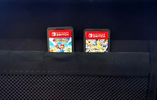 Nintendo Switch OLED + 2 giochi + accessori