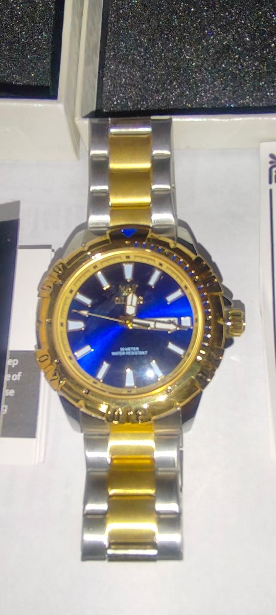 Reloj OLEVS azul y dorado