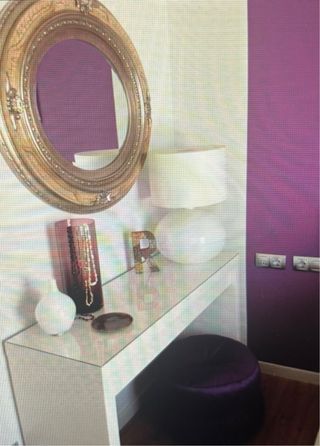 Espejo ovalado beige y plata