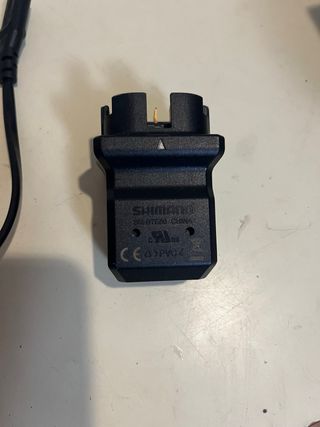 Cargador Shimano Steps y adaptador