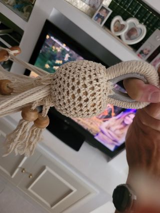 Hamaca beige de tela y madera