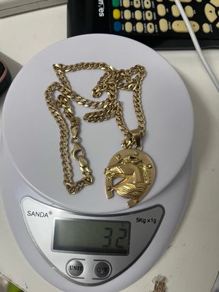 Cadena y colgante oro