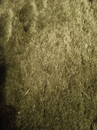 Alfombra verde pelo largo