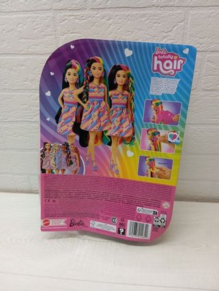 Muñeca pequeña con vestido