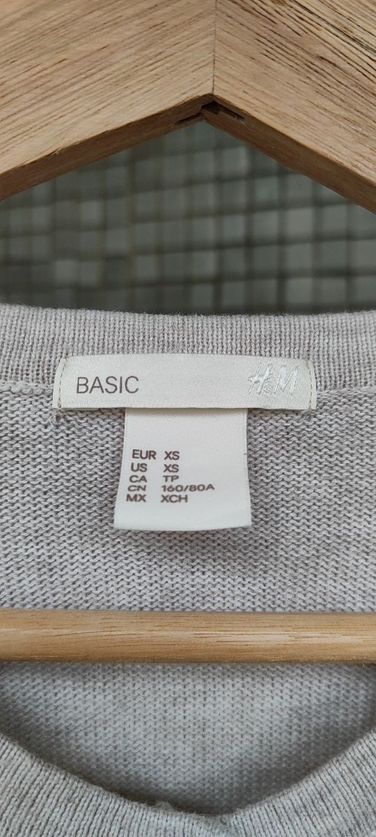 Suéter beige manga larga