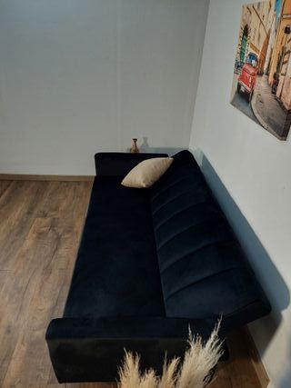 Sofá cama terciopelo negro