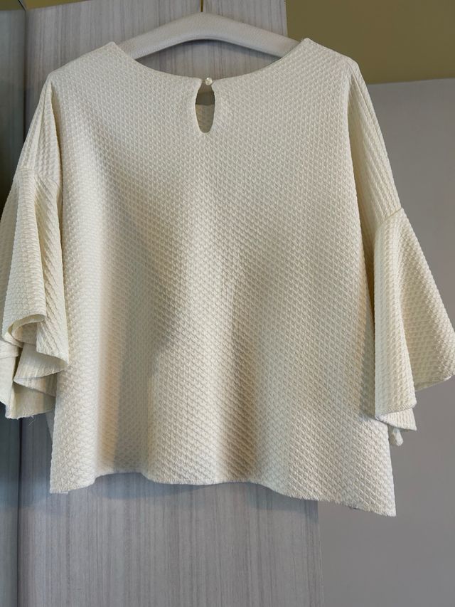 Blusa beige maniche a campana
