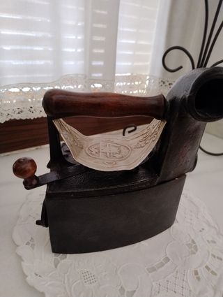 Plancha antigua de forja