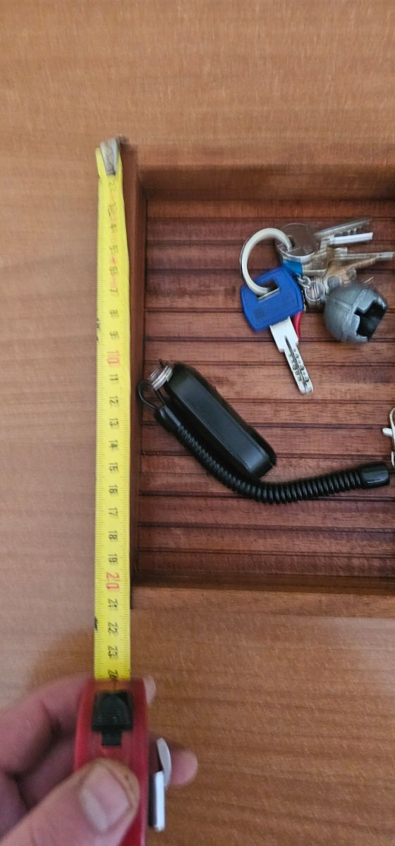 Svuotatasche in legno marrone