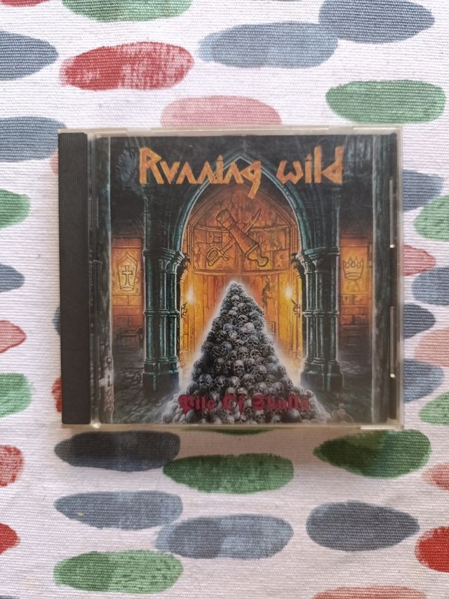 RUNNING WILD PILE OF SKULLS