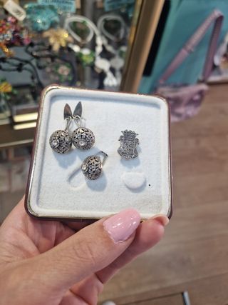 Gemelos y aguja plata