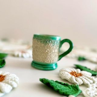 Xícara portuguesa con sapo sorpresa