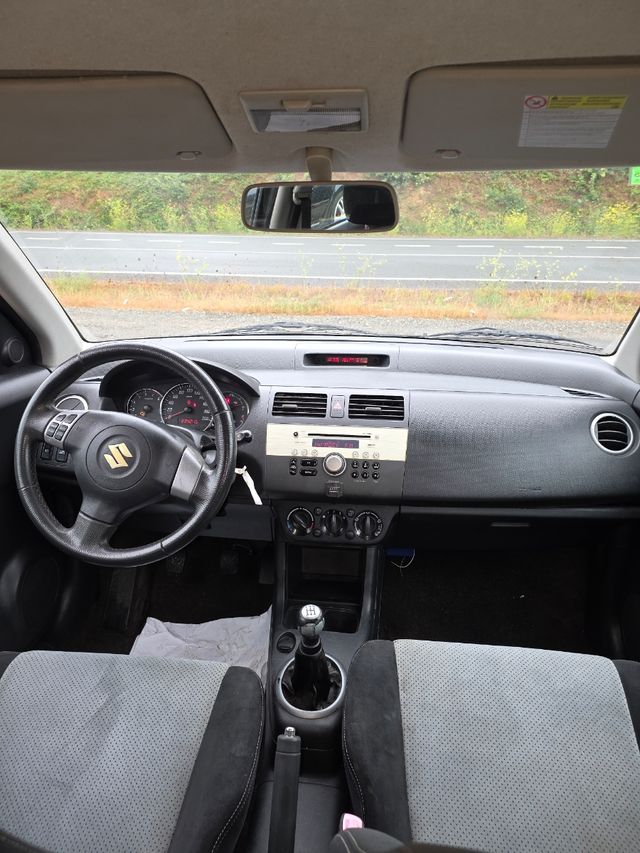 Suzuki Swift impecable