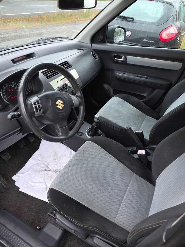 Suzuki Swift impecable