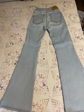 Vaqueros campana tiro alto