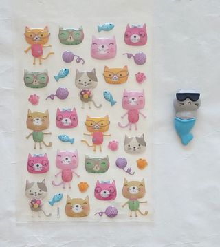 Adesivi + gomma per gatti