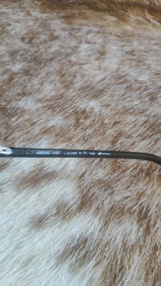 Óculos de sol azuis redondos