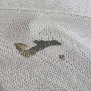 Camiseta Joma blanca y marrón