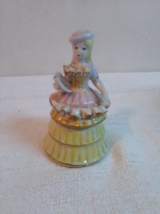 Figura porcelana campanilla antigua