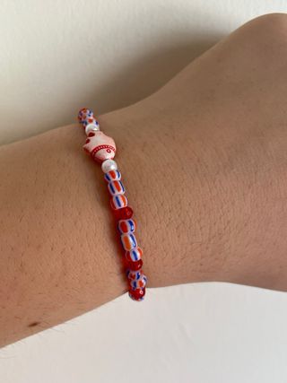 Pulsera de cuentas con pez