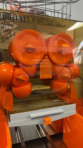 Exprimidor naranja automático