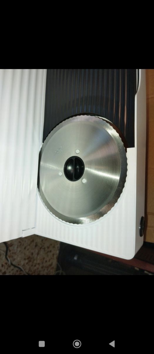 Taglierina elettrica per prosciutto